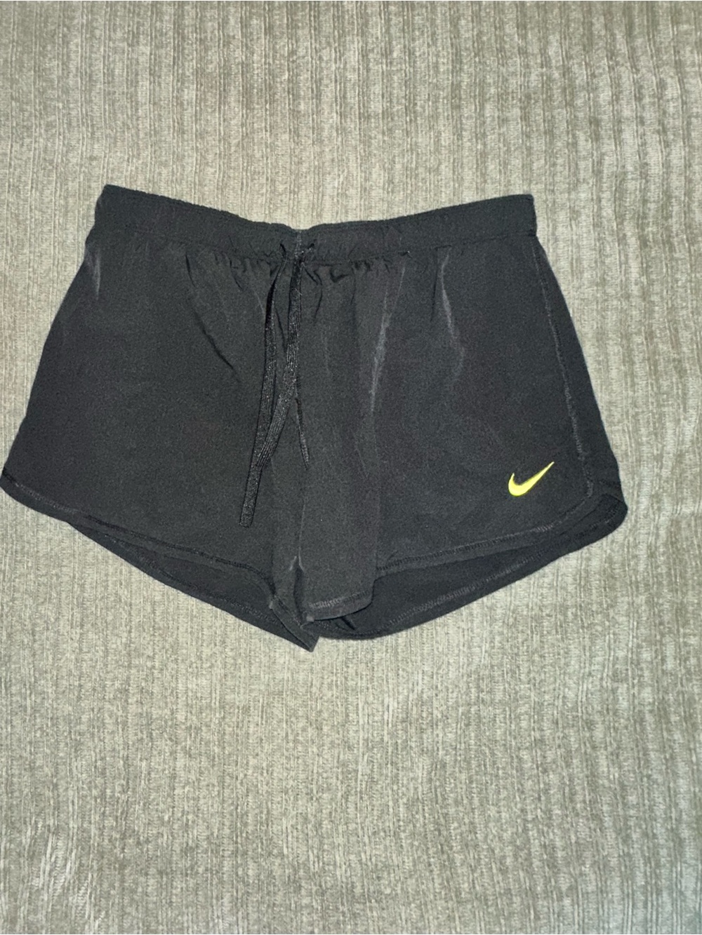 Nike Women’s Black Athletic Shorts with Neon Yellow Swoosh